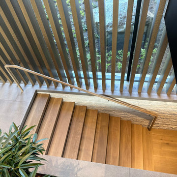Architectural Digest Featured Floating Staircase & Custom Millwork