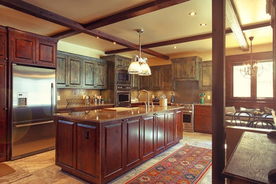 Inspiration for a large timeless l-shaped ceramic tile and beige floor eat-in kitchen remodel in Other with a drop-in sink, medium tone wood cabinets, granite countertops, stainless steel appliances and an island