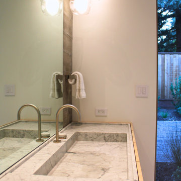 Custom Marble Trough Sink Detail with Pendant Lighting