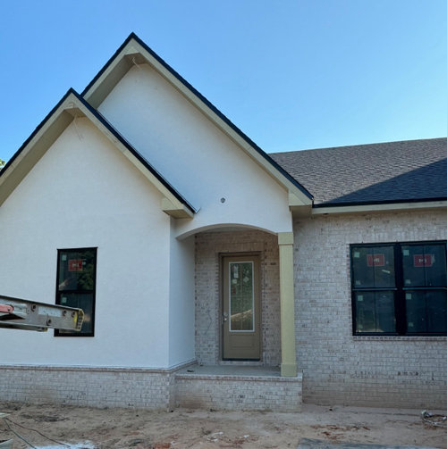 Should I paint the column the same white as the stucco?