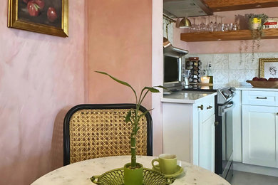 Island style kitchen photo in Miami