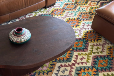 Inspiration for a medium sized traditional open plan living room curtain in London with medium hardwood flooring, a wall mounted tv and panelled walls.