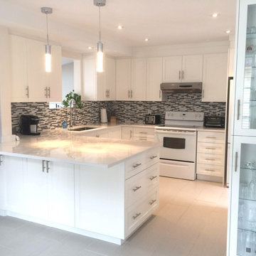 White kitchen in Longueuil, Quebec