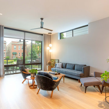 Contemporary Living Room with Floor-to-Ceiling Windows in Chicago Custom Home