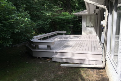 Example of a classic backyard deck design in Minneapolis