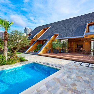 他の地域のトロピカルスタイルのおしゃれなプールの写真