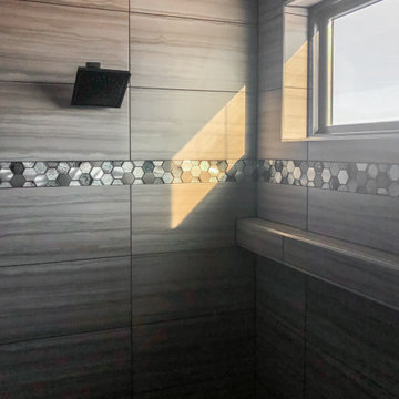 Shower with accent tile and shelf