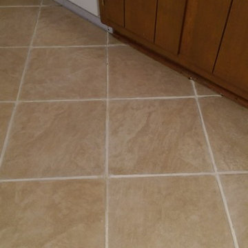 Ceramic Kithcen that has missing and damaged grout
