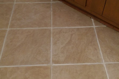 Ceramic Kithcen that has missing and damaged grout