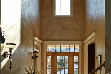 Example of a tuscan entryway design in Other