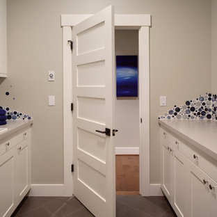 Inspiration for a traditional galley separated utility room in Seattle with a built-in sink.