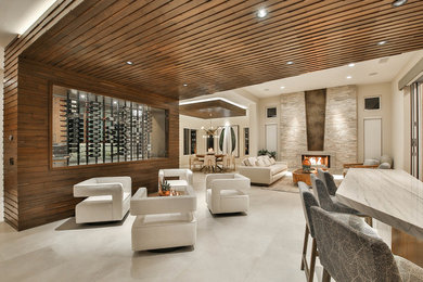 Mid-sized trendy porcelain tile and beige floor seated home bar photo in Los Angeles with quartzite countertops