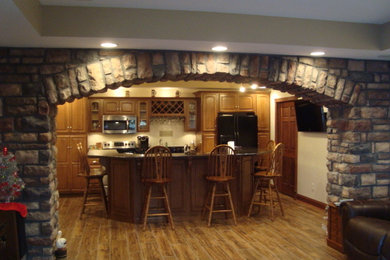 Example of a mountain style basement design in Other
