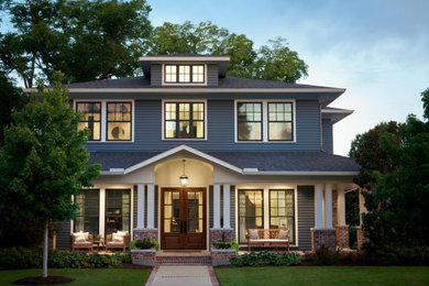 Example of an arts and crafts exterior home design in Dallas