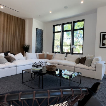 Warm Modern Living Room with Slatted Screen and Deep Sectional - Studio City