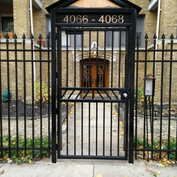 Lincoln Square Chicago. Wrought iron fence rust removal, refinishing & painting