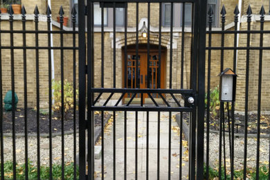 Lincoln Square Chicago. Wrought iron fence rust removal, refinishing & painting