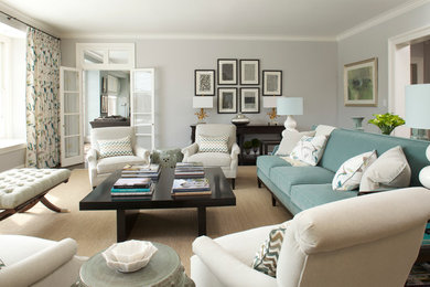 Example of a large transitional formal and enclosed living room design in New York with gray walls, no fireplace and no tv