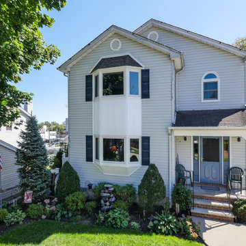 Home Exteriors Showcasing Newly Installed Windows