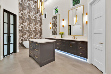 Bathroom - large modern master black and white tile and ceramic tile ceramic tile, gray floor and double-sink bathroom idea in Houston with shaker cabinets, black cabinets, a two-piece toilet, gray walls, an undermount sink, quartz countertops, a hinged shower door, white countertops and a built-in vanity