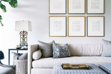 Living room - large transitional medium tone wood floor living room idea in Nashville with gray walls and no tv