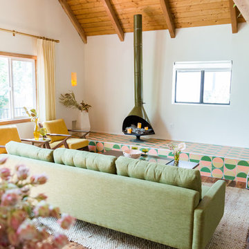 Kitchy Kitchen Cabin: Living Room with Custom Hand Painted Tiles