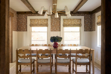Example of a transitional dining room design in New York
