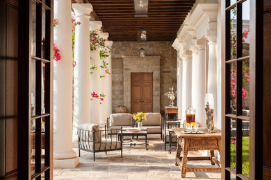 Inspiration for a southwestern back porch remodel in Austin
