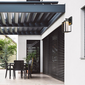 Capulet LED Integrated Outdoor Indoor Wall Sconce, Black, Clear Bubble Glass Cen