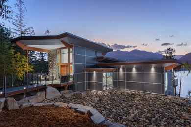Mid-sized trendy gray one-story mixed siding exterior home photo in Vancouver