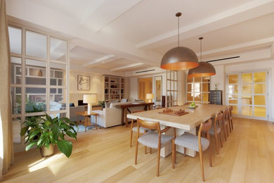 Photo of a large contemporary open plan dining in New York with white walls and light hardwood floors.