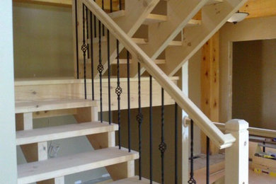Staircase - rustic staircase idea in Minneapolis
