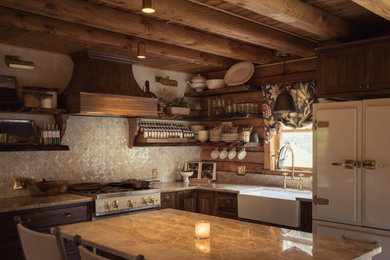 Eat-in kitchen - mid-sized rustic l-shaped slate floor, black floor and wood ceiling eat-in kitchen idea in Richmond with a farmhouse sink, beaded inset cabinets, medium tone wood cabinets, quartzite countertops, white backsplash, ceramic backsplash, white appliances, an island and beige countertops