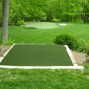Photo of a large victorian backyard partial sun outdoor sport court for spring in New York with natural stone pavers.