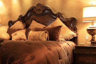 Inspiration for a mid-sized timeless master carpeted bedroom remodel in Houston with beige walls