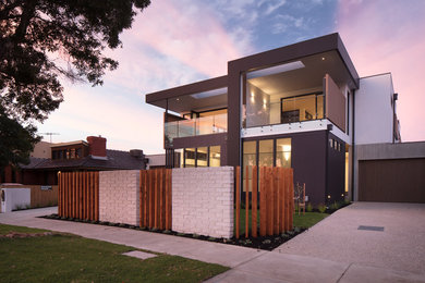 Inspiration for a contemporary townhouse exterior in Melbourne.