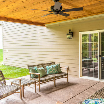Screen Room Addition with Retractable Screens, Outdoor Kitchen, and Patio