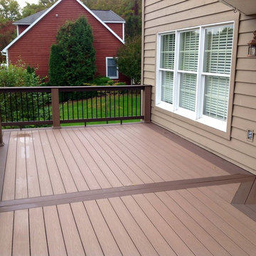 AZEK Deck with Timbertech Builderrail and Genovations Brownstone post wraps