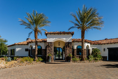 Example of an exterior home design in Other