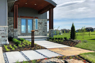 Inspiration for a transitional landscaping in Omaha.