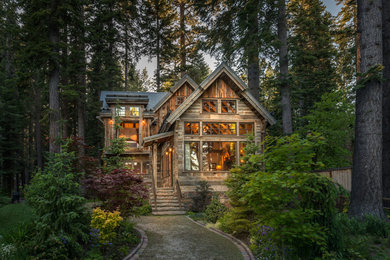 Small cottage two-story wood gable roof idea in Sacramento