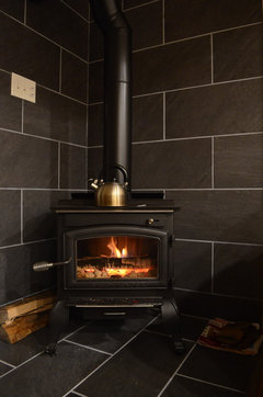 Slate or porcelain tile for the wood stove surround?