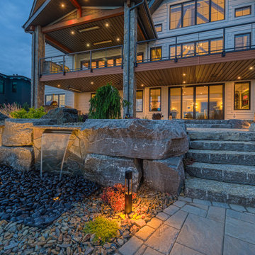 Luxury Backyard Retreat with Armour Stone & Water Feature | Genesis on the Lakes