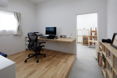 Example of a home office design in Other