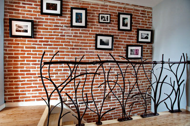 Eclectic wooden staircase photo in Baltimore