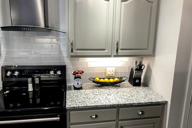 Simply Gray Cabinets with Glass Splash