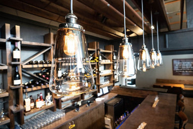 Example of a classic home bar design in Other