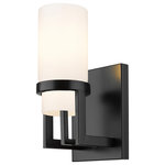 Innovations Lighting - Utopia 1 Light 8" Wall-mounted Sconce, Matte Black, Matte White Glass - Modern and geometric design elements give the Utopia Collection a striking presence. This gorgeous fixture features a sharply squared off frame, softened by a round glass holder that secures a cylindrical glass shade.
