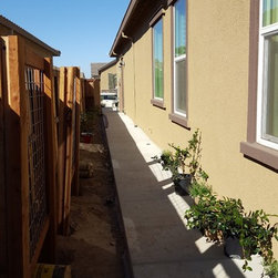 Western side of house after install of walkway and trellises - Lifestyle And Leisure