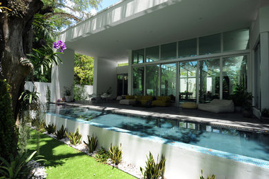 Inspiration for a modern pool remodel in Miami